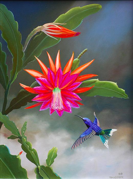 A hummingbird approaching vivid tropical flowers