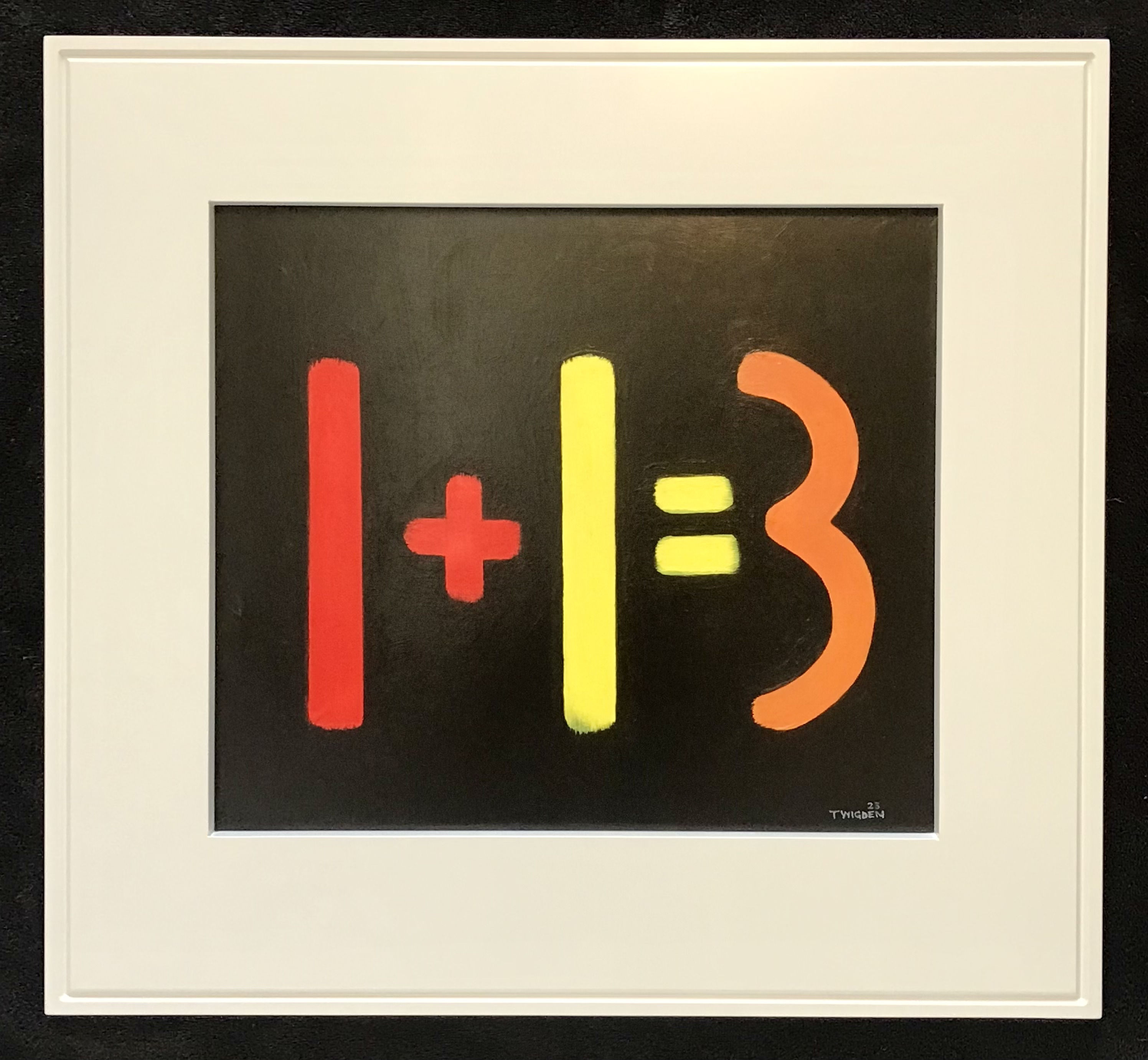 The equation one plus one equals three painted in red, yellow and orange on black